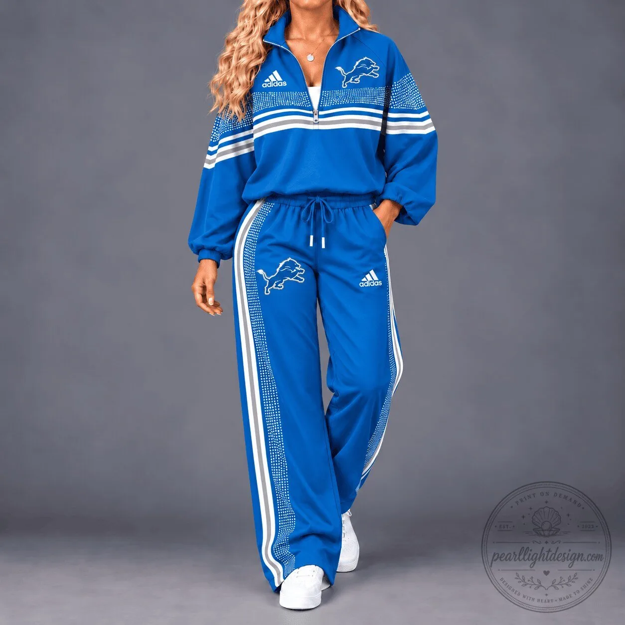 Detroit Lions NFL Team Spirit Blue Quarter-Zip Track Jacket with Striped Pants